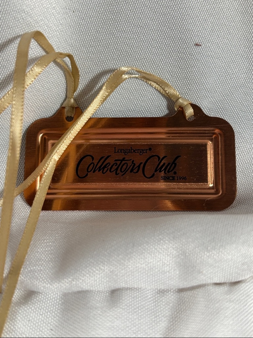 Longaberger Copper-Tone Collectors Club Tie-on